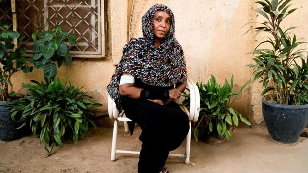 Under Bashir’s rule, women’s lives were tightly controlled by men. Morality laws meant a woman could be arrested for wearing trousers. For that reason, 35-year-old Mahi Aba-Yazid wore trousers while she campaigned for change at the sit-in. She believes she was beaten more because of her choice of fashion. “There was already a bullet in my arm. I was bleeding but they continued to beat me,” she said. (Umit Bektas / REUTERS) Under Bashir’s rule, women’s lives were tightly controlled by men. Morality laws meant a woman could be arrested for wearing trousers. For that reason, 35-year-old Mahi Aba-Yazid wore trousers while she campaigned for change at the sit-in. She believes she was beaten more because of her choice of fashion. “There was already a bullet in my arm. I was bleeding but they continued to beat me,” she said. (Umit Bektas / REUTERS)