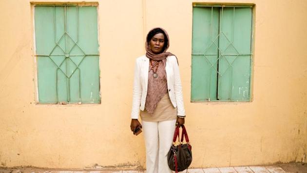 Despite the violence, Sudan’s military rulers and a coalition of opposition and protest groups agreed last week to share power for three years ahead of elections. But Nagda Mansour, a 39-year-old translator who was imprisoned for 75 days after attending a demonstration in December, said it was difficult for many to accept the idea of negotiating with the military because of its leadership’s involvement in the war in Darfur in 2003. (Umit Bektas / REUTERS) Despite the violence, Sudan’s military rulers and a coalition of opposition and protest groups agreed last week to share power for three years ahead of elections. But Nagda Mansour, a 39-year-old translator who was imprisoned for 75 days after attending a demonstration in December, said it was difficult for many to accept the idea of negotiating with the military because of its leadership’s involvement in the war in Darfur in 2003. (Umit Bektas / REUTERS)