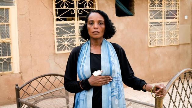 After six years abroad, political activist and blogger Khadija Saleh, 41, returned to Sudan when people took to the streets demanding change. She was at a sit-in near the Defence Ministry in Khartoum on June 3 when security forces stormed the site. The area had become a centre for anti-government protests. Saleh said she was beaten with sticks, and still wears bandages on her wounds. (Umit Bektas / REUTERS) After six years abroad, political activist and blogger Khadija Saleh, 41, returned to Sudan when people took to the streets demanding change. She was at a sit-in near the Defence Ministry in Khartoum on June 3 when security forces stormed the site. The area had become a centre for anti-government protests. Saleh said she was beaten with sticks, and still wears bandages on her wounds. (Umit Bektas / REUTERS)