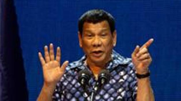 The Philippine president has signed a bill into law penalising a range of acts of sexual harassment including catcalling, wolf-whistling and persistent telling of sexual jokes.(AFP Photo)