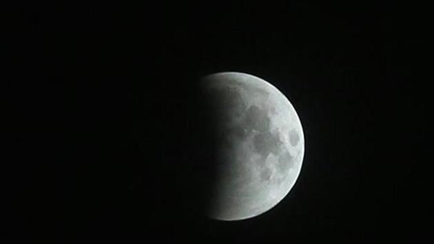 The Moon will remain partially eclipsed till 4:29 am on Wednesday. So it is a golden opportunity for the sky enthusiasts in the country as the eclipse will be visible almost throughout the night, he said.(Himanshu Vyas / Hindustan Times) The Moon will remain partially eclipsed till 4:29 am on Wednesday. So it is a golden opportunity for the sky enthusiasts in the country as the eclipse will be visible almost throughout the night, he said.(Himanshu Vyas / Hindustan Times)