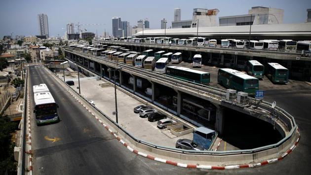 Buses are parked at the bus station. Dancers, musicians and circus artists use its free space to practice and perform, and the homeless are also drawn into its shadows. (Corinna Kern / REUTERS) Buses are parked at the bus station. Dancers, musicians and circus artists use its free space to practice and perform, and the homeless are also drawn into its shadows. (Corinna Kern / REUTERS)