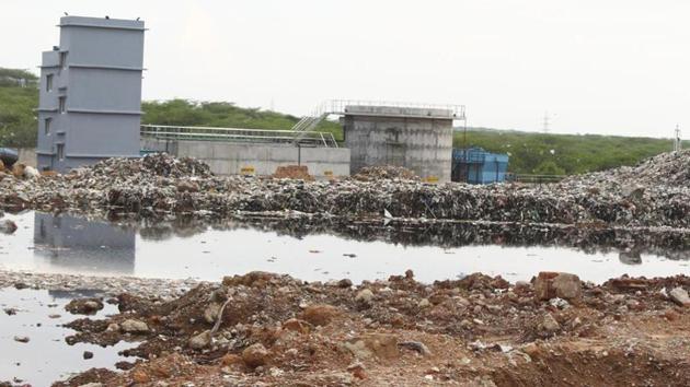 Following fresh spells of rain on Monday and Tuesday, residents of Bandhwari and Mangar villages reported large amounts of leachate run-off from the Bandhwari landfill site. (Yogendra Kumar/HT File Photo)