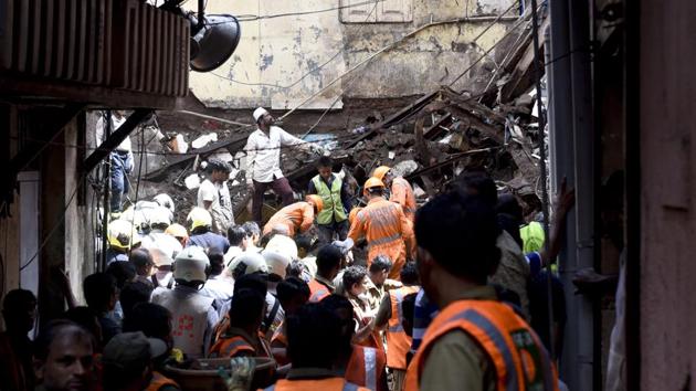 The death toll from the collapse of a four-storey building in south Mumbai’s Dongri rose to 13 on Wednesday, with 10 injured, officials said, as rescue operations continued to find others trapped in the rubble. Out of the 10 people, who were injured after the illegal extension of a 100-year-old Kesarbai building gave way, one is a fireman involved in the rescue operation and another has been sent home. (Kunal Patil / HT Photo) The death toll from the collapse of a four-storey building in south Mumbai’s Dongri rose to 13 on Wednesday, with 10 injured, officials said, as rescue operations continued to find others trapped in the rubble. Out of the 10 people, who were injured after the illegal extension of a 100-year-old Kesarbai building gave way, one is a fireman involved in the rescue operation and another has been sent home. (Kunal Patil / HT Photo)