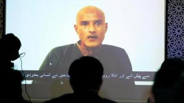 Kulbhushan Jadhav is seen on a screen during a news conference at the Ministry of Foreign Affairs in Islamabad, Pakistan December 25, 2017.(Reuters)