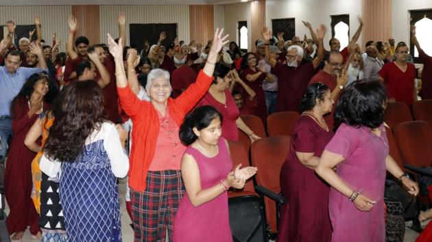 Devotees of Osho dance and celebrate on the occasion of Guru Purnima at Abdul Kalam Azad memorial hall. (HT PHOTO) Devotees of Osho dance and celebrate on the occasion of Guru Purnima at Abdul Kalam Azad memorial hall. (HT PHOTO)
