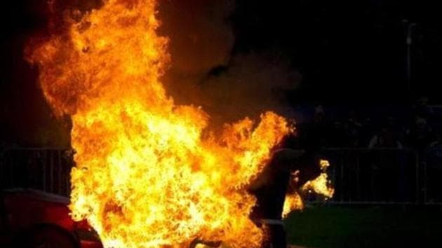 A 30-year-old woman allegedly poured kerosene on herself and her two minor children and set herself and them afire . (File Photo) A 30-year-old woman allegedly poured kerosene on herself and her two minor children and set herself and them afire . (File Photo)