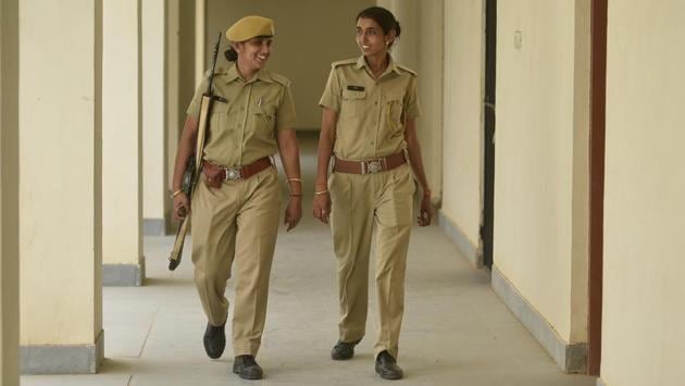 Women police personnel at the station. The police station also has a separate help desk for women, a waiting room furnished with sofa sets, and walls without any trace of gutkha stains. When complainants walk into the police station, they are greeted with the trademark welcome: “We promise you relief within 24 hours.” (Biplov Bhuyan / HT Photo) Women police personnel at the station. The police station also has a separate help desk for women, a waiting room furnished with sofa sets, and walls without any trace of gutkha stains. When complainants walk into the police station, they are greeted with the trademark welcome: “We promise you relief within 24 hours.” (Biplov Bhuyan / HT Photo)