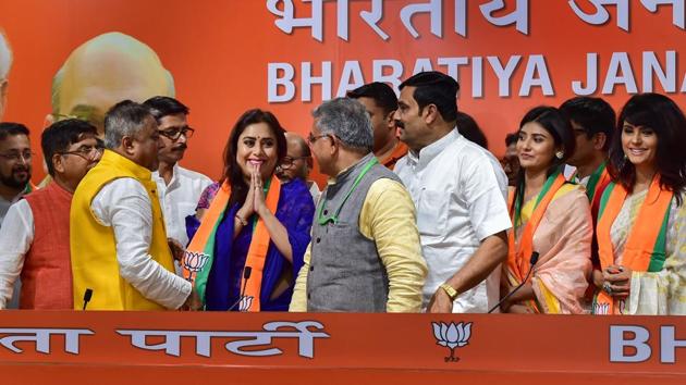 West Bengal BJP chief Dilip Ghosh and party leader Rahul Sinha welcomes the Bengali actors into the party.(PTI)