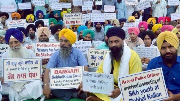 File photo of a protest against inaction on Justice Ranjit Singh commission report on Bargari/Behbal Kalan Issue at Bhandari bridge in Amritsar.(Sameer Sehgal / HT File)