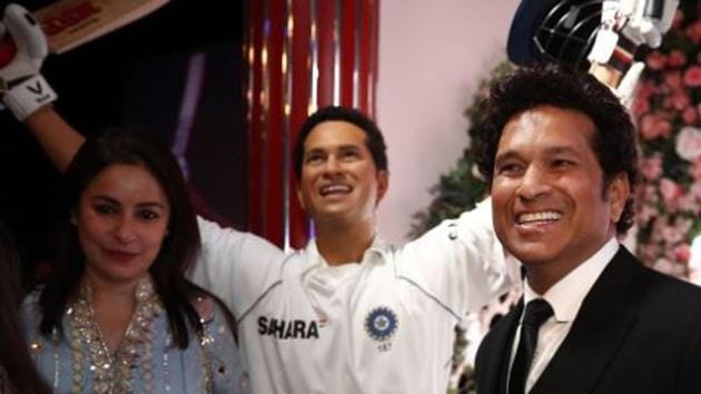 Sachin Tendulkar and wife Anjali stand next to the legend’s wax statue.(Twitter/ICC)