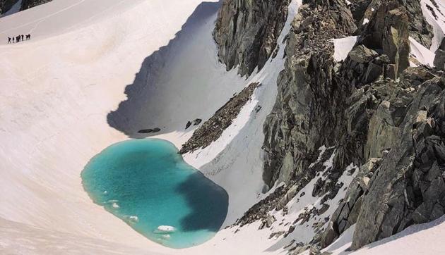 A lake at the base of the Dent du Géant and the Aiguilles Marbrées. (Instagram/@bryanthealpinist)