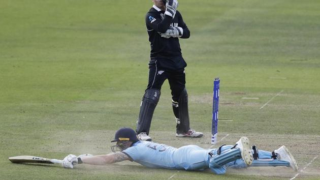 England's Ben Stokes dives in to make his ground and get a 6 from overthrows.(AP)