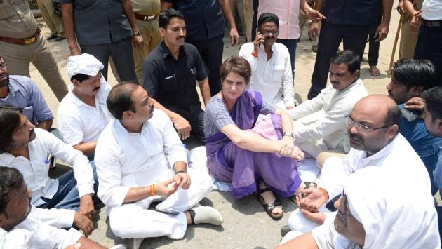 Congress general secretary Priyanka Gandhi Vadra was stopped by police in Uttar Pradesh’s Sonbhadra district while on her way to meet the families of those killed in a shooting over a land dispute on Wednesday. A village head and his supporters allegedly opened fire on a rival group over a land dispute in Ghorawal police station area, killing 10 people, including three women, and leaving 19 injured on Wednesday. (AICC / AFP) Congress general secretary Priyanka Gandhi Vadra was stopped by police in Uttar Pradesh’s Sonbhadra district while on her way to meet the families of those killed in a shooting over a land dispute on Wednesday. A village head and his supporters allegedly opened fire on a rival group over a land dispute in Ghorawal police station area, killing 10 people, including three women, and leaving 19 injured on Wednesday. (AICC / AFP)
