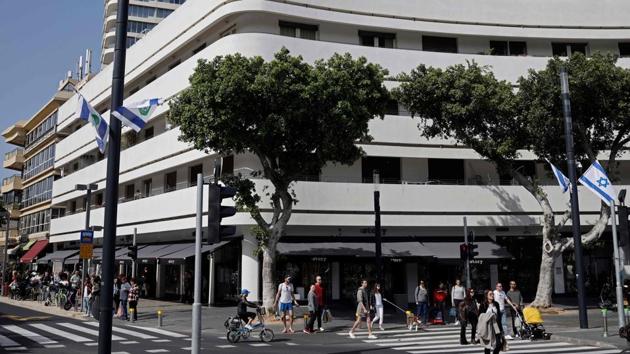 The 94-96 Dizengoff Street building, built in 1936 by architect Yehuda Magidovitch. Co-founder of the Bauhaus Centre Micha Gross claimed that no other city in the world has a larger collection of Bauhaus buildings than Tel Aviv. “Maintaining and restoring these buildings is complex,” says Gross, who explains that it takes between eight to 10 years to renovate a building. (Thomas Coex / AFP) 