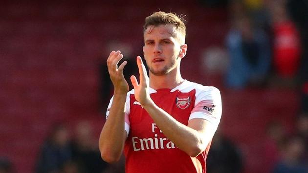 Arsenal's Rob Holding applauds fans after the match.(REUTERS)