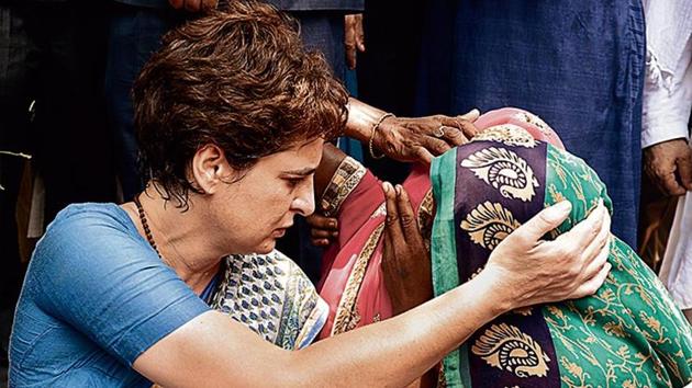 AICC general secretary Priyanka Gandhi Vadra with the relatives of the people killed in Sonbhadra, in Mirzapur on Saturday. (ANI) AICC general secretary Priyanka Gandhi Vadra with the relatives of the people killed in Sonbhadra, in Mirzapur on Saturday. (ANI)