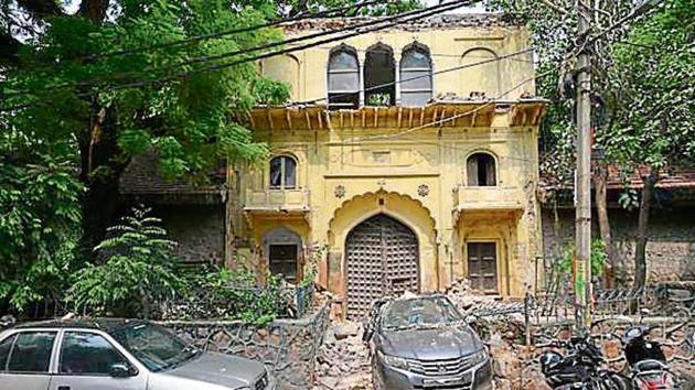 Part of a 18th century gateway in East of Kailash’s Garhi village came crashing on a car parked underneath it. Part of a 18th century gateway in East of Kailash’s Garhi village came crashing on a car parked underneath it.