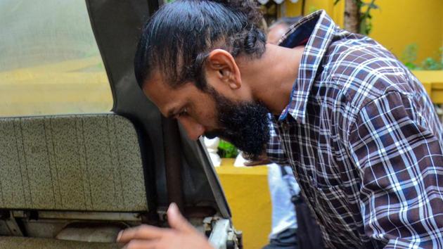 Samson D'Souza, accused in the Scarlett Keeling murder case, leaves surrounded by policemen after being sentenced to ten year imprisonment by the Bombay High Court in Goa on July 19, 2019. - An Indian court on July 19 sent a bartender to jail for 10 years over the sexual assault and killing of British schoolgirl Scarlett Keeling on a Goa beach in 2008.(AFP)