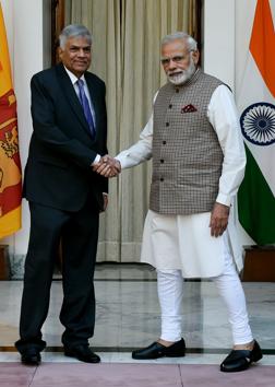 Prime Minister Narendra Modi shakes hands with Sri Lankan Prime Minister Ranil Wickremesinghe before a meeting at Hyderabad House in New Delhi on November 23, 2017.(File photo by AFP)