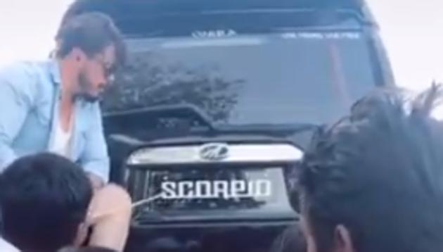 In the video, a group of men is seen trying to pronounce the word “Scorpio.” (Twitter/@anandmahindra) In the video, a group of men is seen trying to pronounce the word “Scorpio.” (Twitter/@anandmahindra)