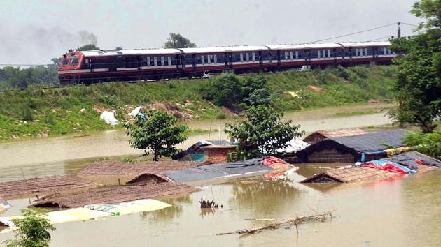 Houses near the railway track completely submerged following incessant rain at Mithan Sharay Block under Muzaffarpur.(ANI Photo)