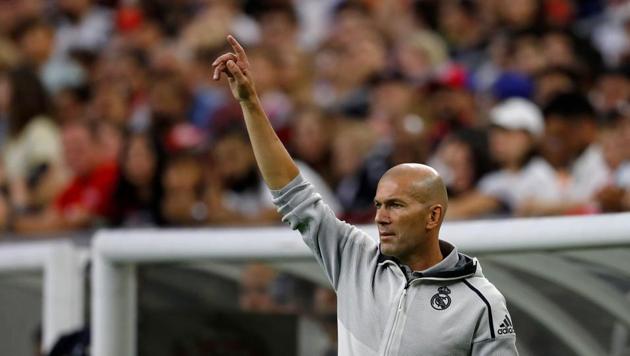 TOPSHOT - Real Madrid head coach Zinedine Zidane coaches against Bayern Munich during their International Champions Cup match on July 20, 2019 at NRG Stadium in Houston, Texas. (Photo by AARON M. SPRECHER / AFP)(AFP)