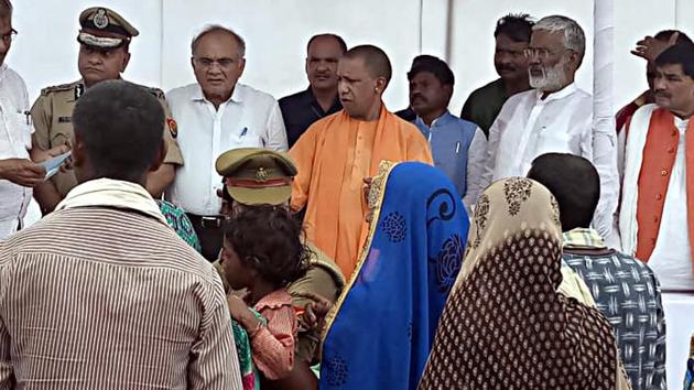 UP chief minister Yogi Adityanath on Sunday met the kin of the 10 people killed in a shoot-out in Sonbhadra’s Umbha village. (ANI) UP chief minister Yogi Adityanath on Sunday met the kin of the 10 people killed in a shoot-out in Sonbhadra’s Umbha village. (ANI)