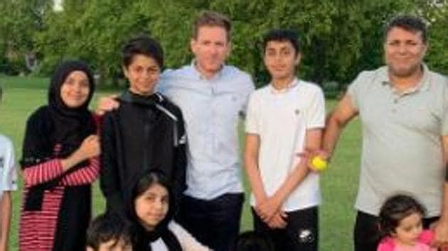 Eoin Morgan shared a picture of himself with an Afghan family.(Eoin Morgan/ Twitter)