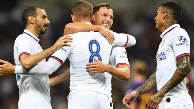 Chelsea's English midfielder Ross Barkley (2nd L-#8) is congratulated after scoring during a football friendly match.(AFP)