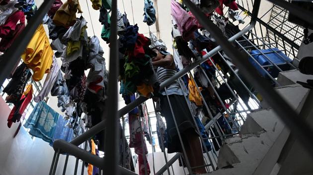 A minor held at a juvenile detention centre collects his laundry in Malolos town. Youth advocate Louise Suamen warns mixing youngsters who have committed minor infringements with older criminals could create a “school of crime”. (Ted Aljibe / AFP) A minor held at a juvenile detention centre collects his laundry in Malolos town. Youth advocate Louise Suamen warns mixing youngsters who have committed minor infringements with older criminals could create a “school of crime”. (Ted Aljibe / AFP)