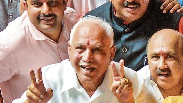 BJP State President BS Yeddyurappa with his party MLAs show victory sign after HD Kumaraswamy lost the vote of confidence (Photo: PTI) BJP State President BS Yeddyurappa with his party MLAs show victory sign after HD Kumaraswamy lost the vote of confidence (Photo: PTI)