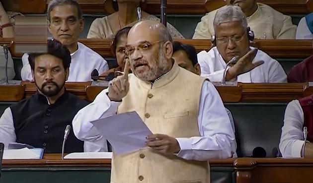 Union Home Minister Amit Shah speaks in the Lok Sabha, during the Budget Session of Parliament. (PTI Photo) Union Home Minister Amit Shah speaks in the Lok Sabha, during the Budget Session of Parliament. (PTI Photo)