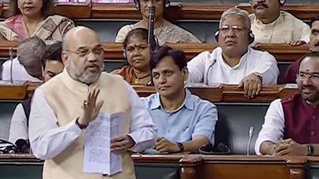 Union Home Minister Amit Shah speaks in the Lok Sabha, during the Budget Session of Parliament, in New Delhi, Wednesday.(PTI)