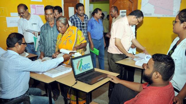 People check their name on the draft list of the National Register of Citizens at a seva kendra, Hatigaon, Guwahati, July 30, 2018(Rajib Jyoti Sarma / Hindustan Times) People check their name on the draft list of the National Register of Citizens at a seva kendra, Hatigaon, Guwahati, July 30, 2018(Rajib Jyoti Sarma / Hindustan Times)