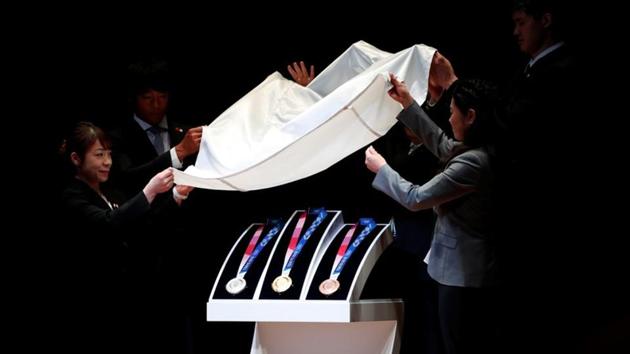 Tokyo Organising Committee of the Olympic and Paralympic Games unveiled the Olympic medal design, medal ribbon and medal case for Tokyo 2020 Olympic Games at ‘One Year to Go’ ceremony in Tokyo International Forum. (Issei Kato / REUTERS) Tokyo Organising Committee of the Olympic and Paralympic Games unveiled the Olympic medal design, medal ribbon and medal case for Tokyo 2020 Olympic Games at ‘One Year to Go’ ceremony in Tokyo International Forum. (Issei Kato / REUTERS)