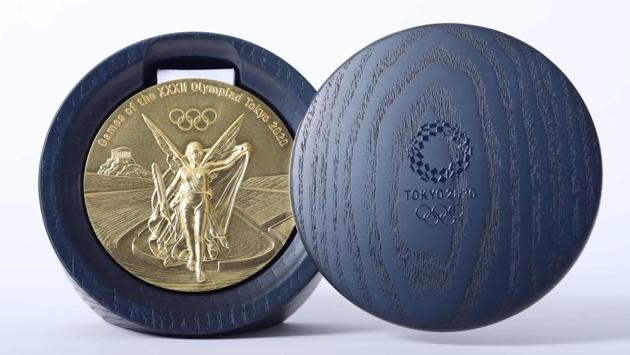 The front side of gold medal for the Tokyo 2020 Olympic Games. (AFP) The front side of gold medal for the Tokyo 2020 Olympic Games. (AFP)