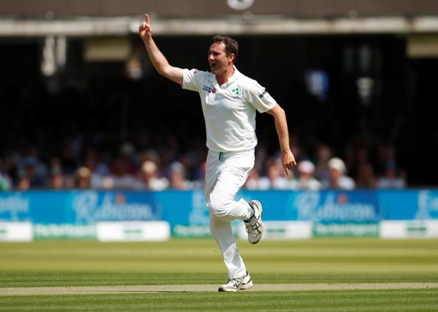 Ireland's Tim Murtagh celebrates taking the wicket of England's Rory Burns.(Action Images via Reuters)