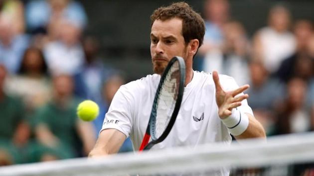 Andy Murray in action during his second round mixed doubles match.(REUTERS) Andy Murray in action during his second round mixed doubles match.(REUTERS)