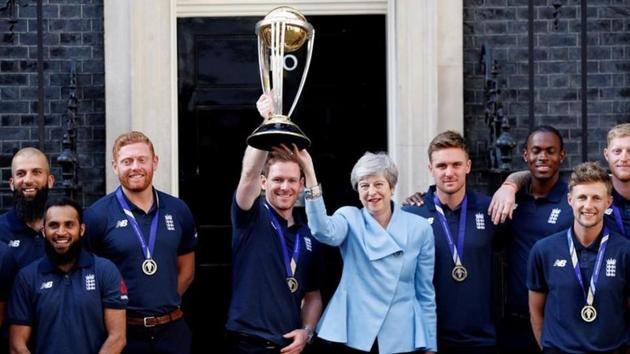 Former British PM Theresa May with England’s World Cup winning cricket team at 10 Downing Street.(REUTERS PHOTO.)