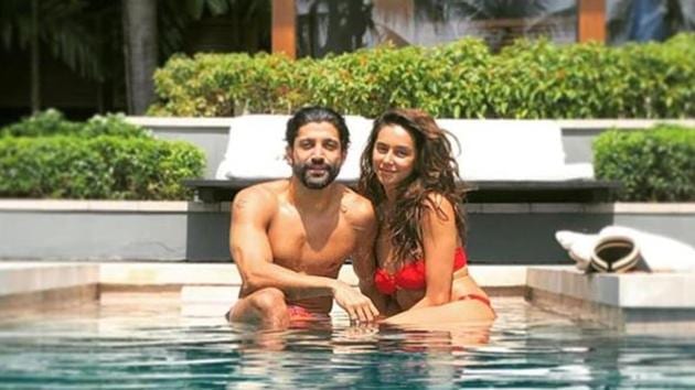 Farhan Akhtar and Shibani Dandekar pose by the poolside.(Instagram)