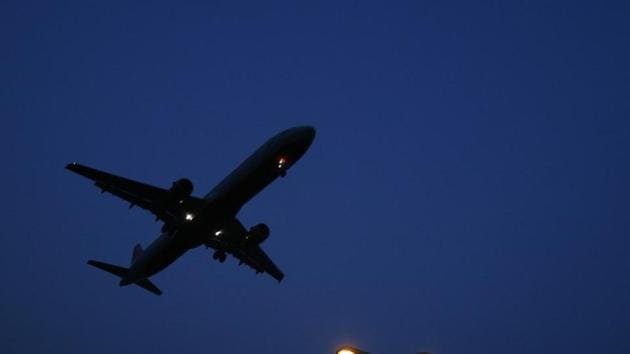 An aeroplane prepares to land at an airport.(REUTERS)