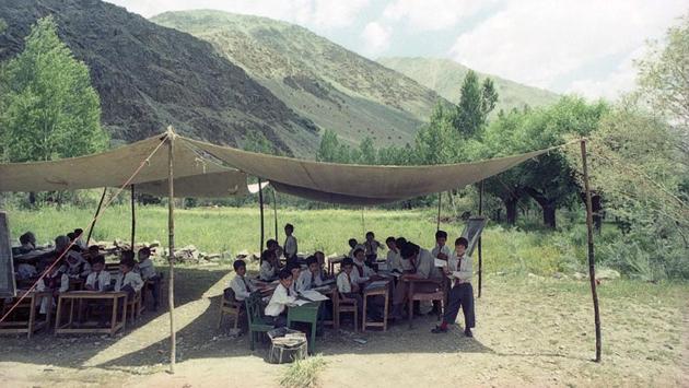 School children at RR School, June 28, 1999. The conflict broke out after intrusion by Pakistani elements was reported by local nomads on May 03, 1999 in the Kargil region. The harsh winter months had traditionally seen a seasonal abandonment of forward posts and reduced patrolling along the LoC by both sides. (Manish Swarup / HT Archive) School children at RR School, June 28, 1999. The conflict broke out after intrusion by Pakistani elements was reported by local nomads on May 03, 1999 in the Kargil region. The harsh winter months had traditionally seen a seasonal abandonment of forward posts and reduced patrolling along the LoC by both sides. (Manish Swarup / HT Archive)