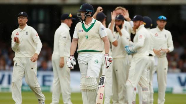 Ireland's Kevin O'Brien walks off as England players celebrate his dismissal by LBW.(Reuters) Ireland's Kevin O'Brien walks off as England players celebrate his dismissal by LBW.(Reuters)