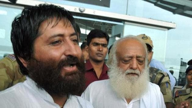 Asaram and his son Narayan Sai (PTI Photo)