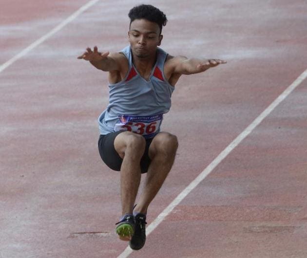 Kevin Wilson from Bengle Sports Academy during boys under 20 category long jump at Balewadi.(Milind Saurkar/HT Photo)