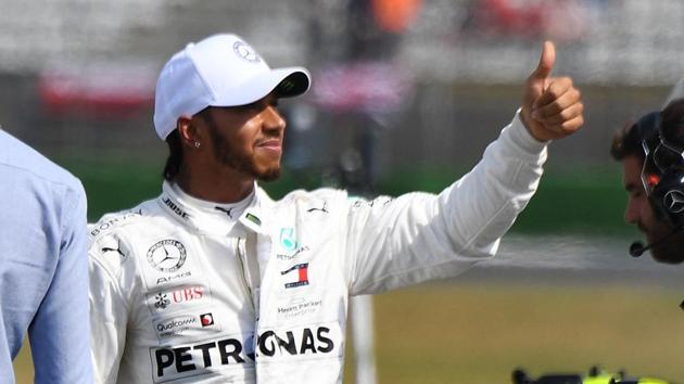 Mercedes' British driver Lewis Hamilton reacts after the qualifying session. (AFP) Mercedes' British driver Lewis Hamilton reacts after the qualifying session. (AFP)