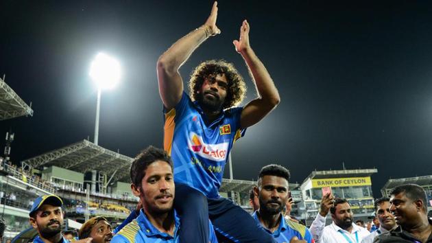 Lasith Malinga, who played the last One Day International (ODI) cricket match of his career, celebrates with teammates.(AFP)