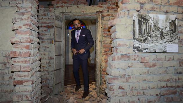 Indian film actor Rahul Bose looks at an installation representing a riot-hit house during the time of the India-Pakistan partition at the Partition Museum in Amritsar, Punjab. (Narinder Nanu / AFP) Indian film actor Rahul Bose looks at an installation representing a riot-hit house during the time of the India-Pakistan partition at the Partition Museum in Amritsar, Punjab. (Narinder Nanu / AFP)