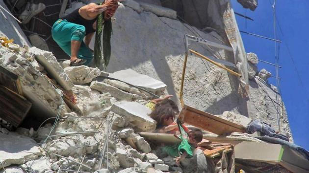 Of the three girls shown in the photo, one is dead and two are fighting to stay alive, after regime airstrikes hit their home, said Dr Ismail, who treated the victims in a nearby hospital. (Photo: AFP) Of the three girls shown in the photo, one is dead and two are fighting to stay alive, after regime airstrikes hit their home, said Dr Ismail, who treated the victims in a nearby hospital. (Photo: AFP)